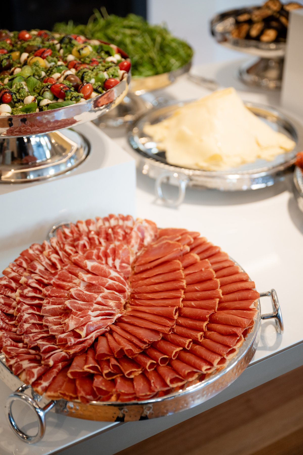 Cold meats fanned across a round platter
